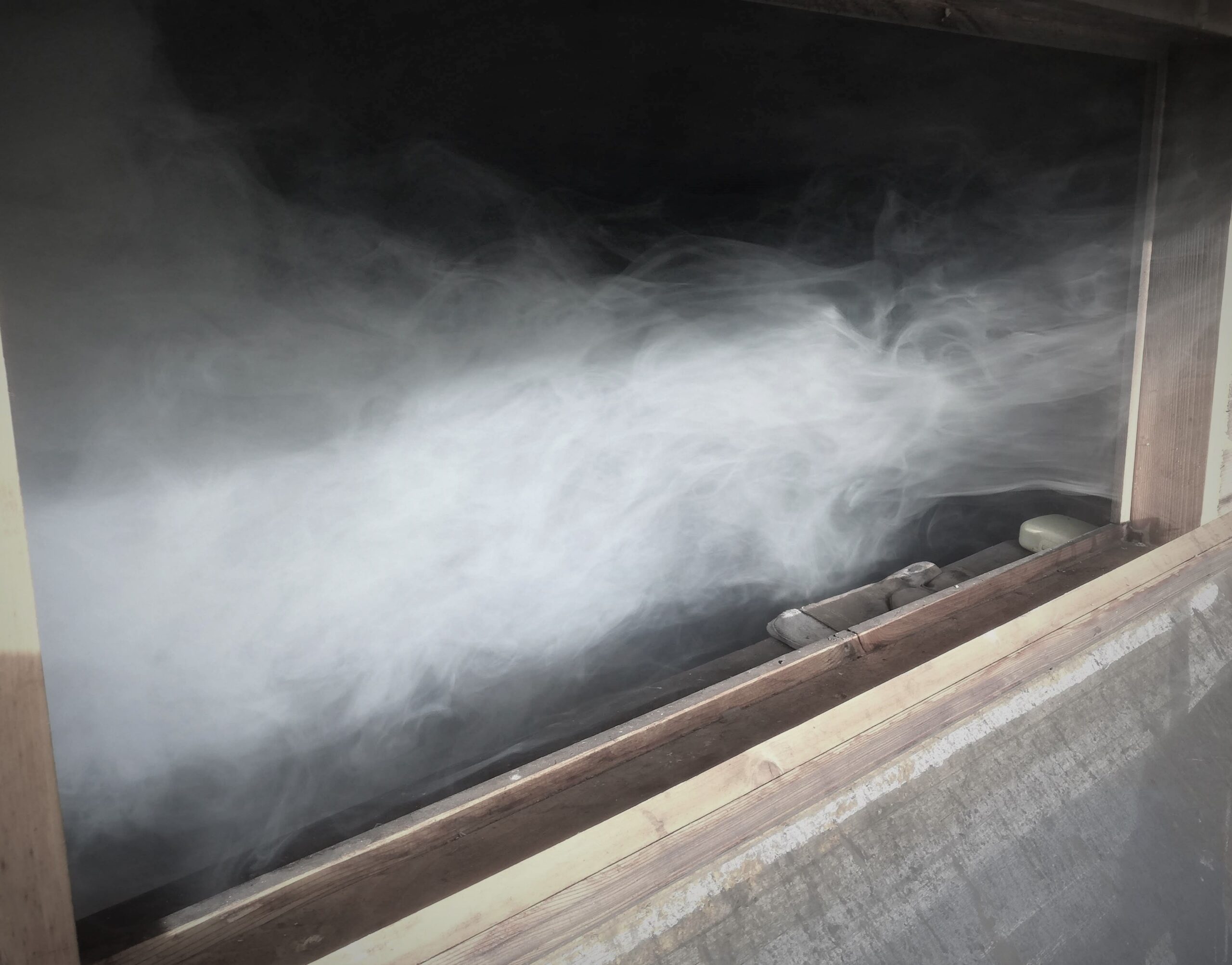 Smoke pouring from the sauna